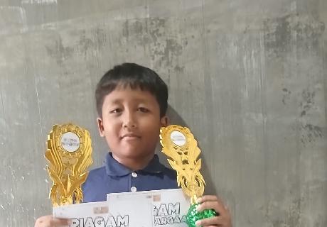 Muhammad Rafli Alfarezi Siswa Kelas 1C Raih Dua Juara Olimpiade dalam Ajang Back to School 2026